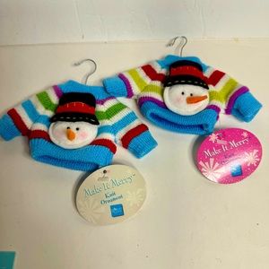 NWT. 2 knit sweater ornaments with 3-dimensional snowman. Brand is Russ.